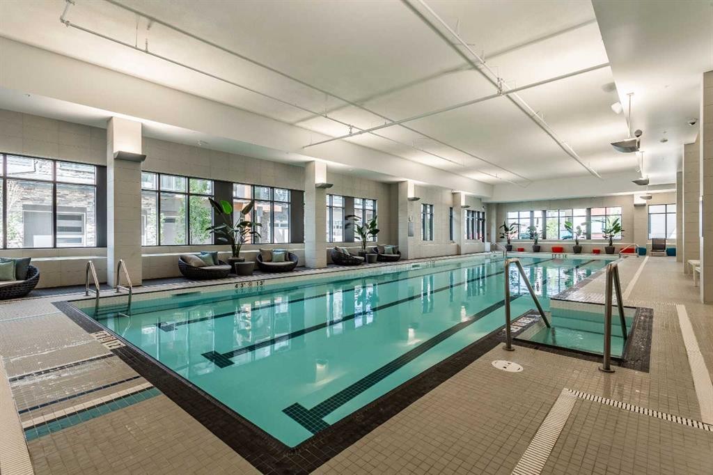 219-12 Mahogany Path Se, Calgary, AB - Indoor Photo Showing Other Room With In Ground Pool