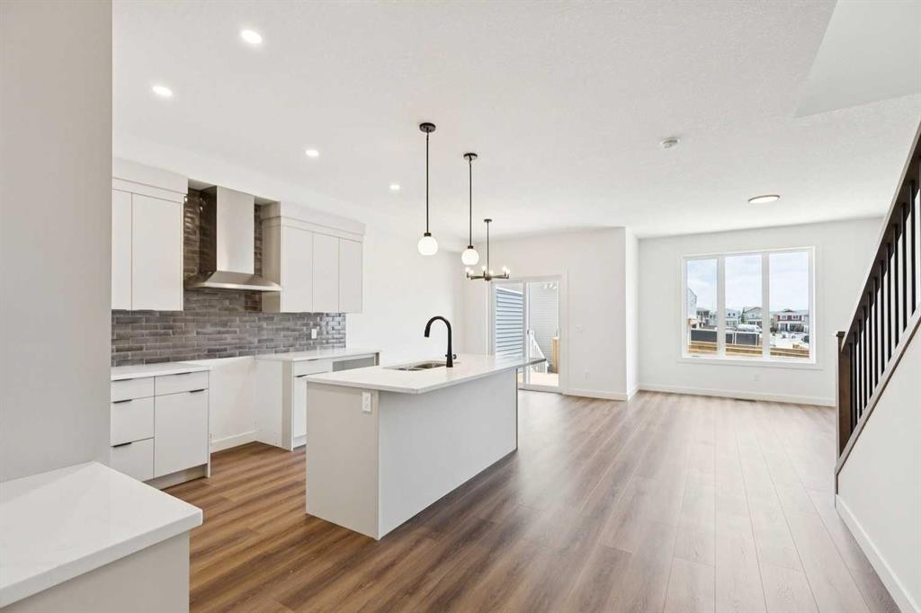 69 Heritage Park, Cochrane, AB - Indoor Photo Showing Kitchen With Upgraded Kitchen