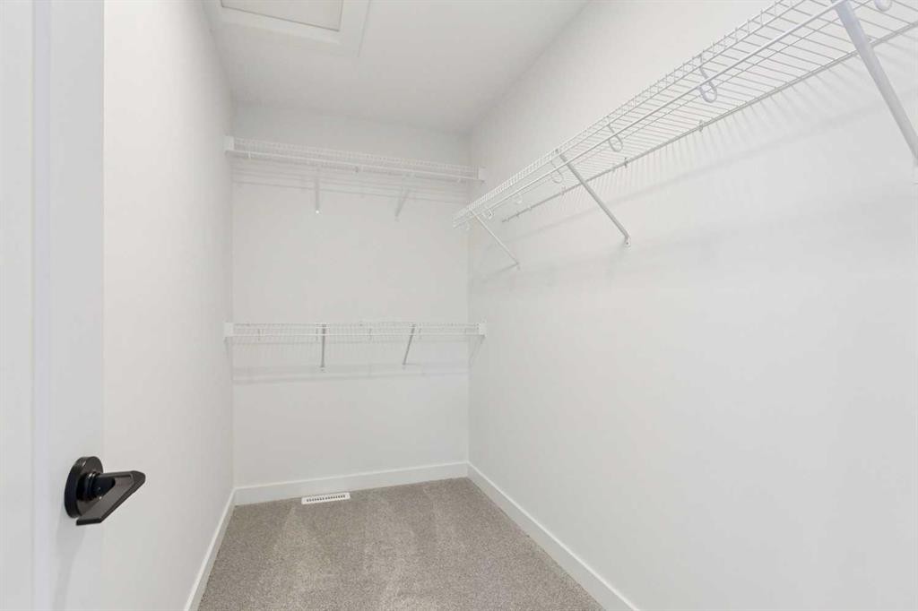 69 Heritage Park, Cochrane, AB - Indoor With Storage