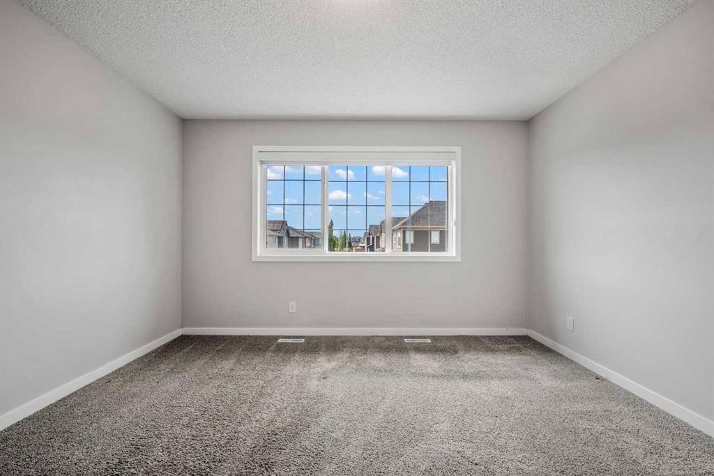 244 Sundown View, Cochrane, AB - Indoor Photo Showing Other Room