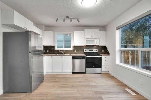 145 Bridleglen Road Sw, Calgary, AB - Indoor Photo Showing Kitchen