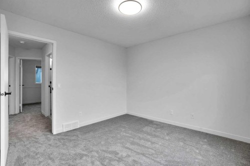 145 Bridleglen Road Sw, Calgary, AB - Indoor Photo Showing Other Room