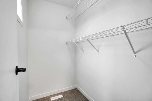 145 Bridleglen Road Sw, Calgary, AB - Indoor With Storage