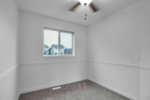 145 Bridleglen Road Sw, Calgary, AB - Indoor Photo Showing Other Room