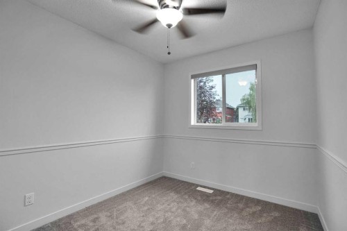 145 Bridleglen Road Sw, Calgary, AB - Indoor Photo Showing Other Room
