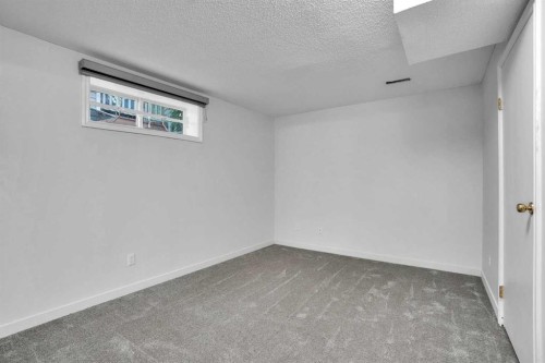 145 Bridleglen Road Sw, Calgary, AB - Indoor Photo Showing Other Room