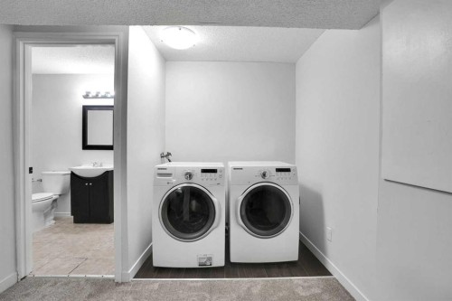 145 Bridleglen Road Sw, Calgary, AB - Indoor Photo Showing Laundry Room