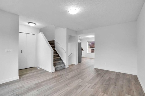 145 Bridleglen Road Sw, Calgary, AB - Indoor Photo Showing Other Room