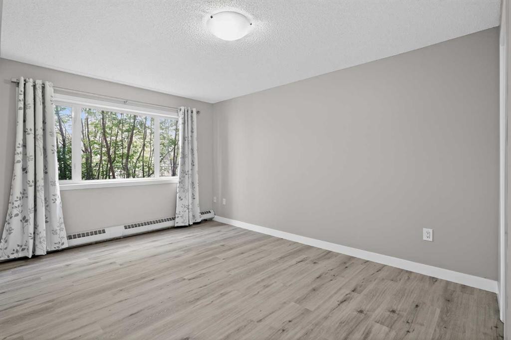 116-790 Kingsmere Crescent Sw, Calgary, AB - Indoor Photo Showing Other Room