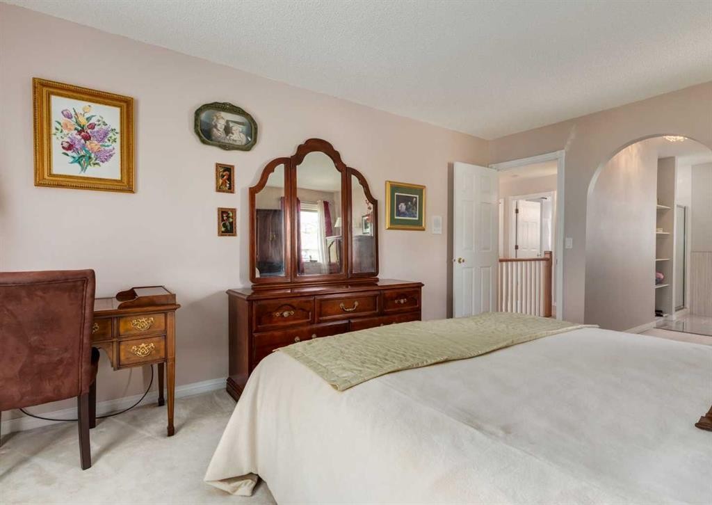 63 Arbour Lake Drive Nw, Calgary, AB - Indoor Photo Showing Bedroom