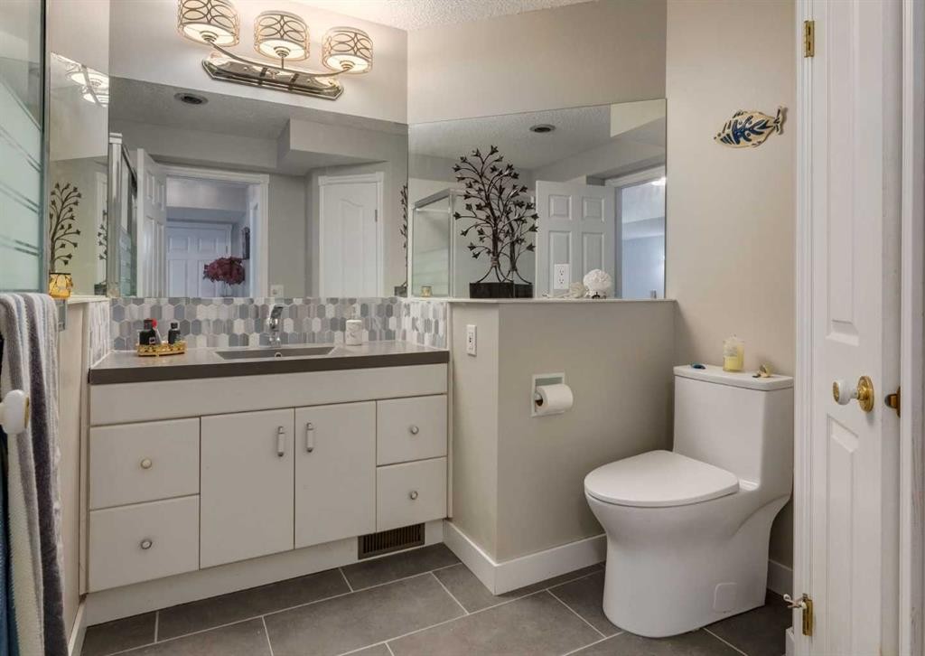 63 Arbour Lake Drive Nw, Calgary, AB - Indoor Photo Showing Bathroom