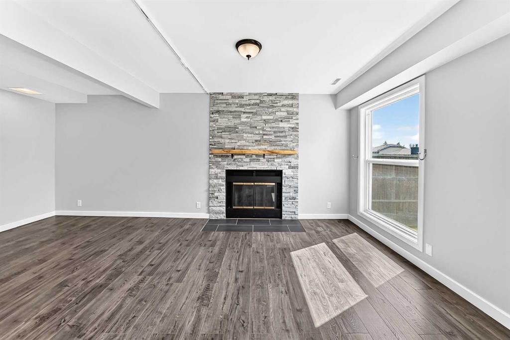 8 Hawkfield Crescent Nw, Calgary, AB - Indoor Photo Showing Living Room With Fireplace