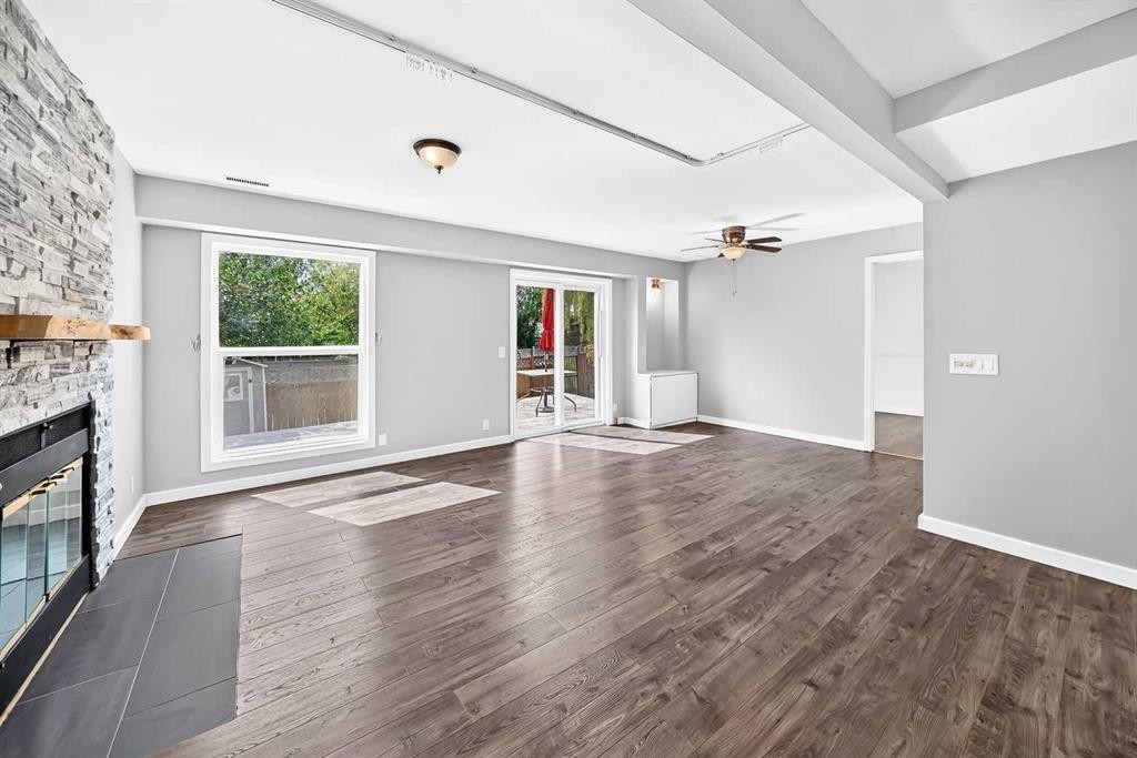 8 Hawkfield Crescent Nw, Calgary, AB - Indoor Photo Showing Living Room With Fireplace