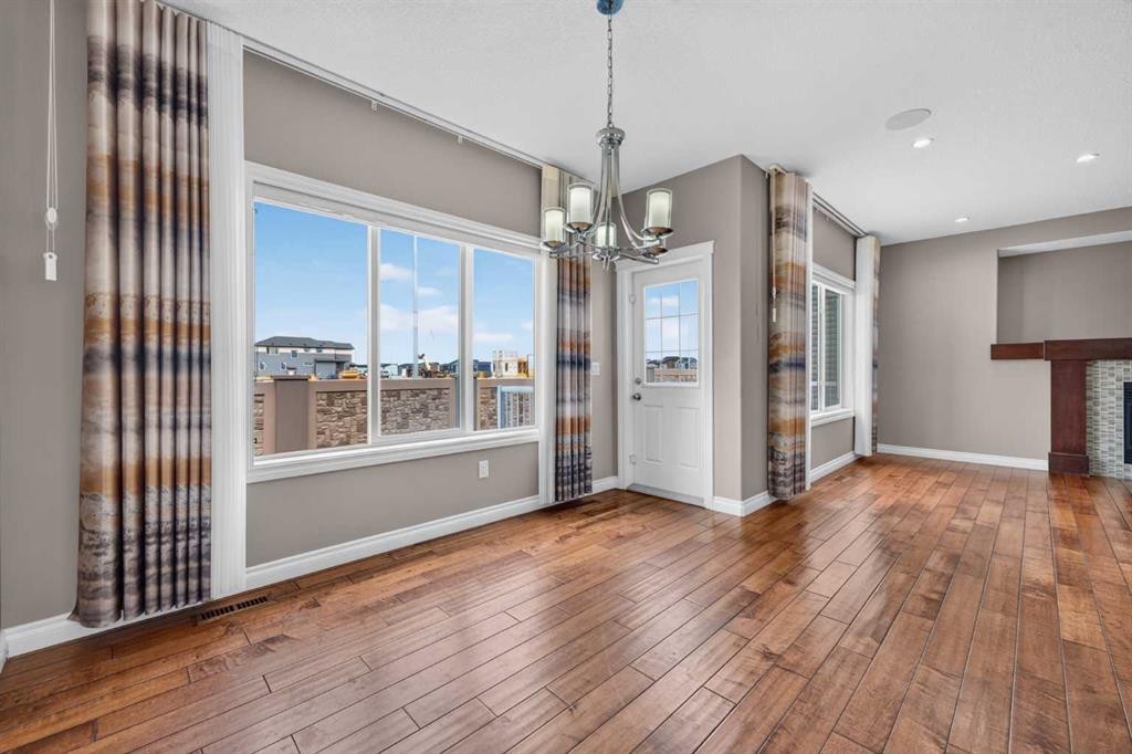 148 Evansborough Way Nw, Calgary, AB - Indoor With Fireplace