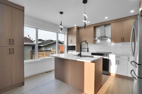 78 Saddlecrest Place Ne, Calgary, AB - Indoor Photo Showing Kitchen With Upgraded Kitchen