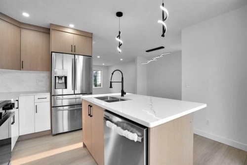 78 Saddlecrest Place Ne, Calgary, AB - Indoor Photo Showing Kitchen With Double Sink With Upgraded Kitchen