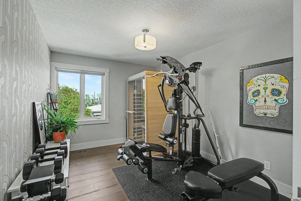 1355 Colgrove Avenue Ne, Calgary, AB - Indoor Photo Showing Gym Room