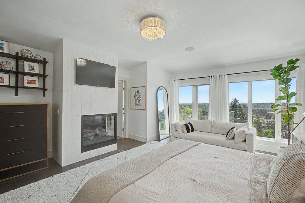 1355 Colgrove Avenue Ne, Calgary, AB - Indoor Photo Showing Other Room With Fireplace