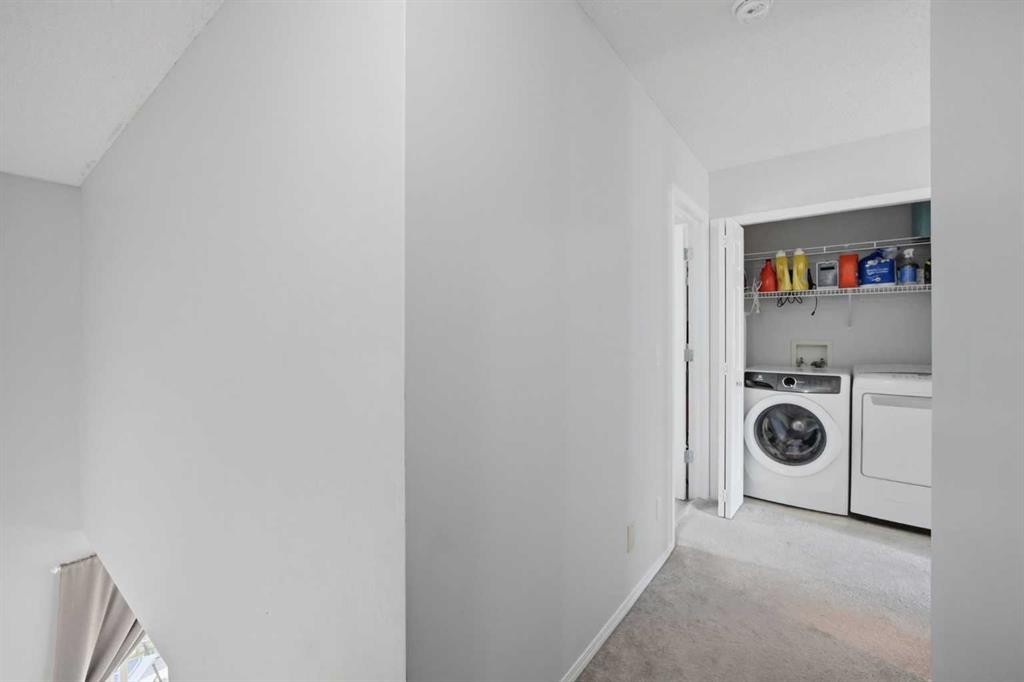 47 Bridlewood View Sw, Calgary, AB - Indoor Photo Showing Laundry Room