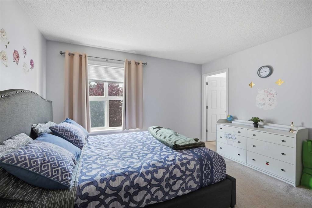 47 Bridlewood View Sw, Calgary, AB - Indoor Photo Showing Bedroom