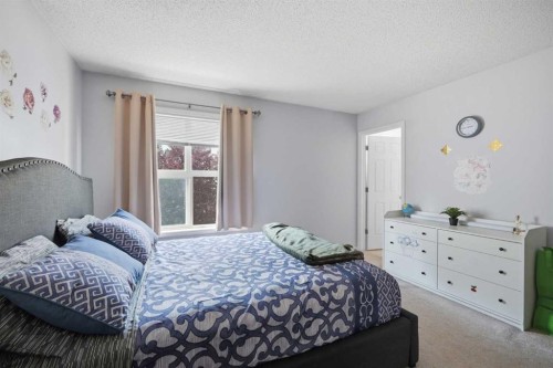 47 Bridlewood View Sw, Calgary, AB - Indoor Photo Showing Bedroom
