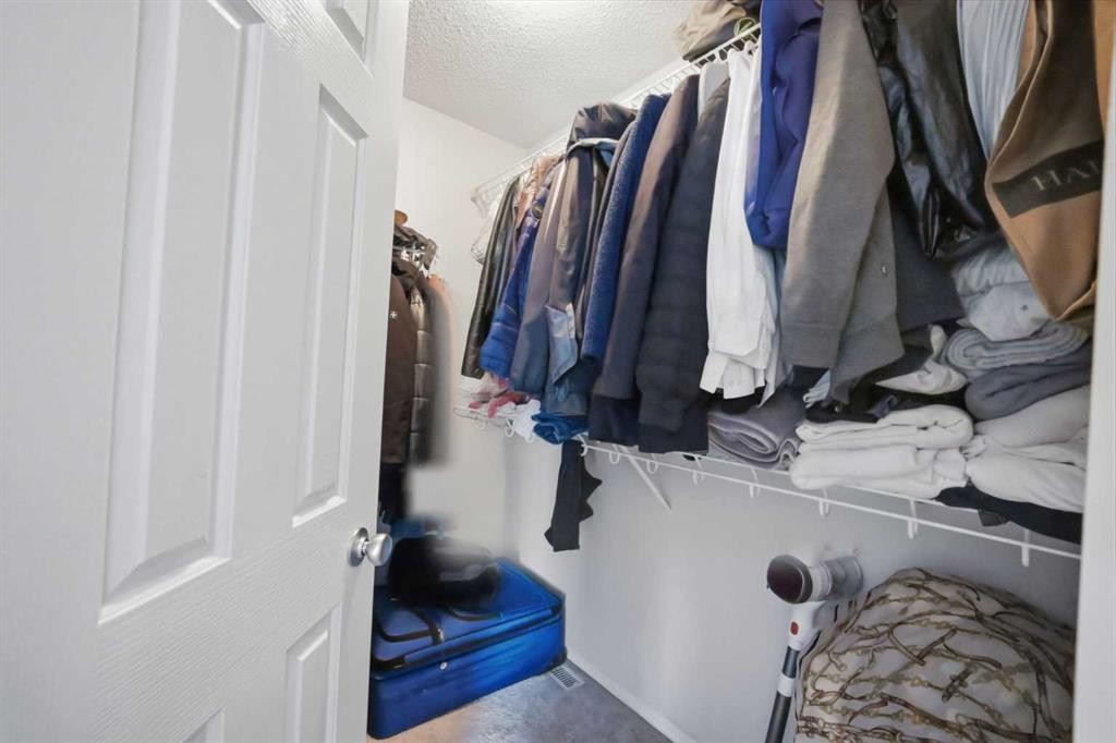 47 Bridlewood View Sw, Calgary, AB - Indoor With Storage