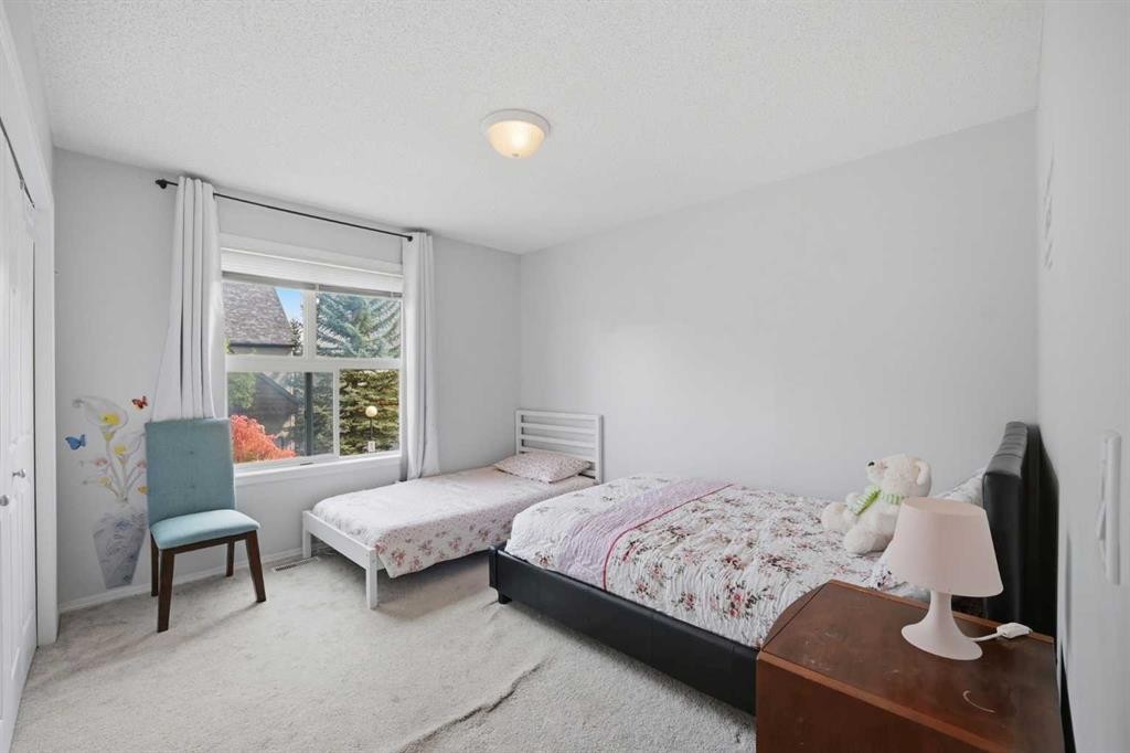 47 Bridlewood View Sw, Calgary, AB - Indoor Photo Showing Bedroom