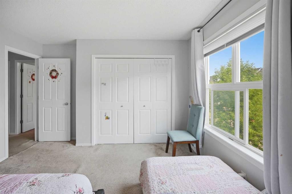 47 Bridlewood View Sw, Calgary, AB - Indoor Photo Showing Bedroom