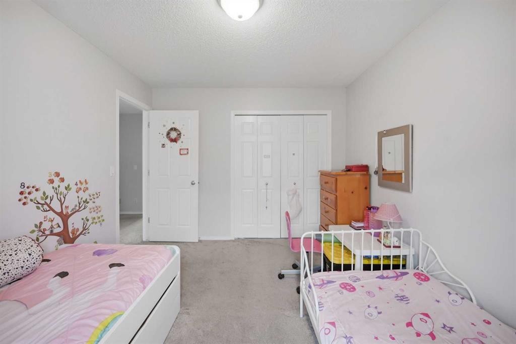 47 Bridlewood View Sw, Calgary, AB - Indoor Photo Showing Bedroom