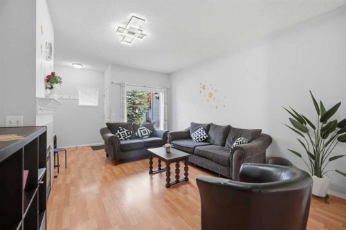 47 Bridlewood View Sw, Calgary, AB - Indoor Photo Showing Living Room