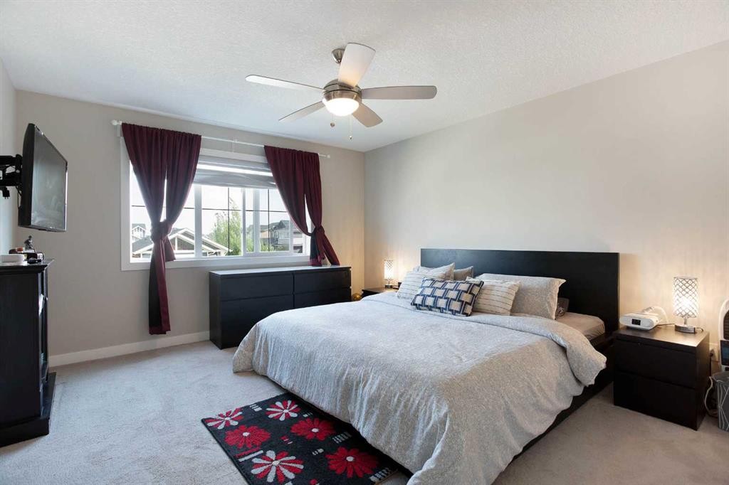7 Emberside Hollow, Cochrane, AB - Indoor Photo Showing Bedroom