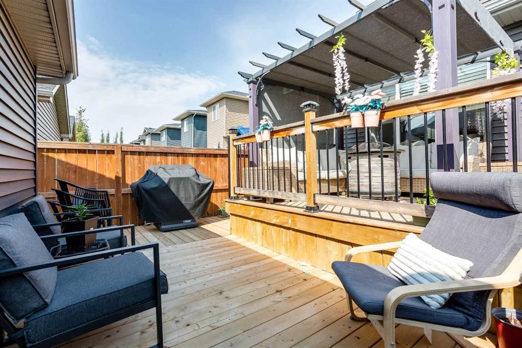 7 Emberside Hollow, Cochrane, AB - Outdoor With Deck Patio Veranda With Exterior