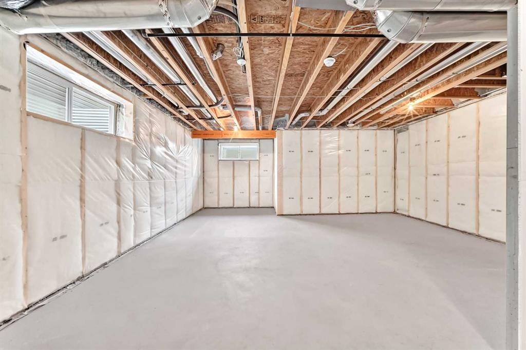 27 Redstone Heights Ne, Calgary, AB - Indoor Photo Showing Basement