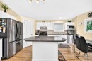 50 Somerside Manor Sw, Calgary, AB  - Indoor Photo Showing Kitchen With Double Sink 