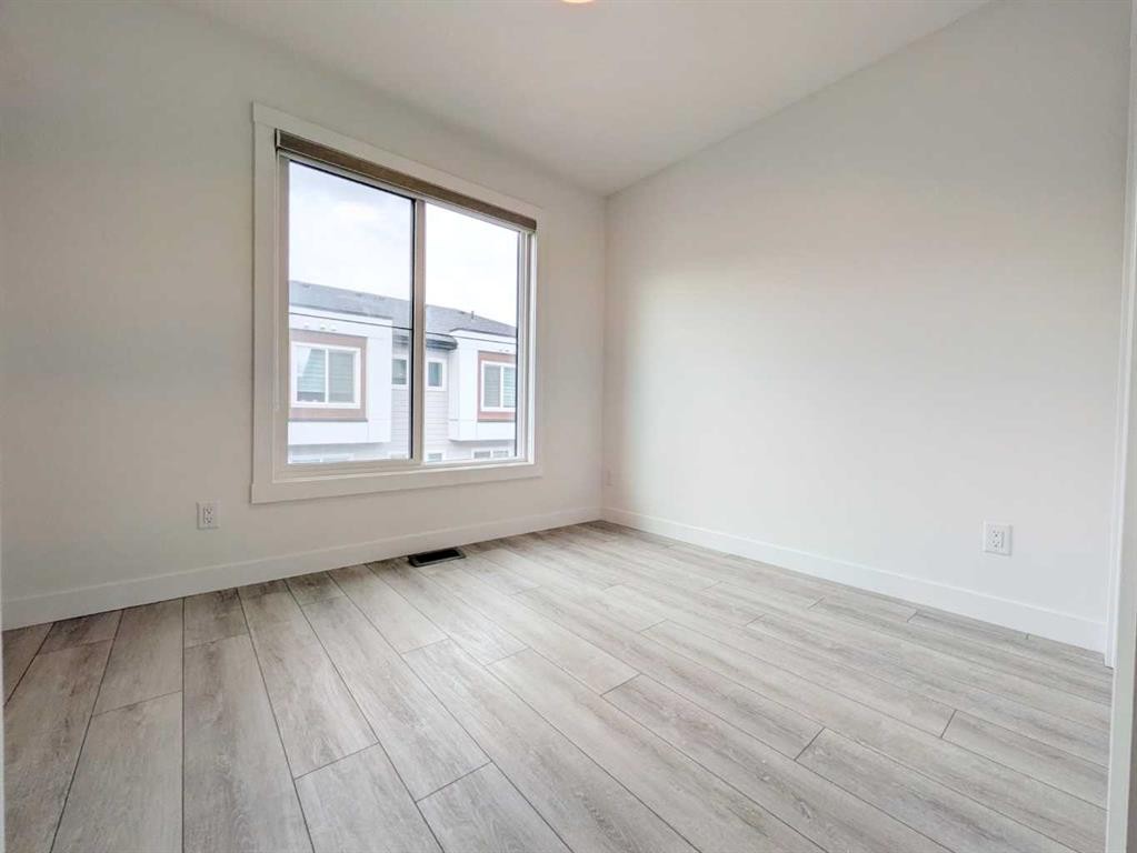 152-380 Seton Villas Se, Calgary, AB - Indoor Photo Showing Other Room