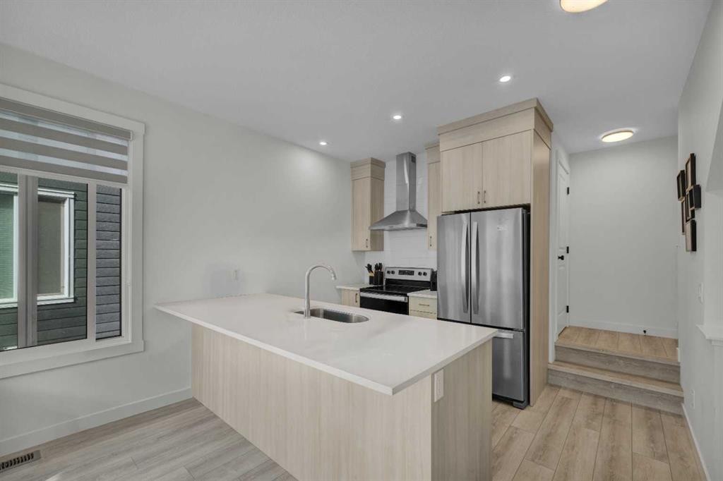 152-380 Seton Villas Se, Calgary, AB - Indoor Photo Showing Kitchen With Stainless Steel Kitchen