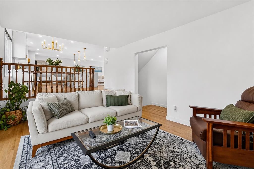 10719 Mapleglen Crescent Se, Calgary, AB - Indoor Photo Showing Living Room