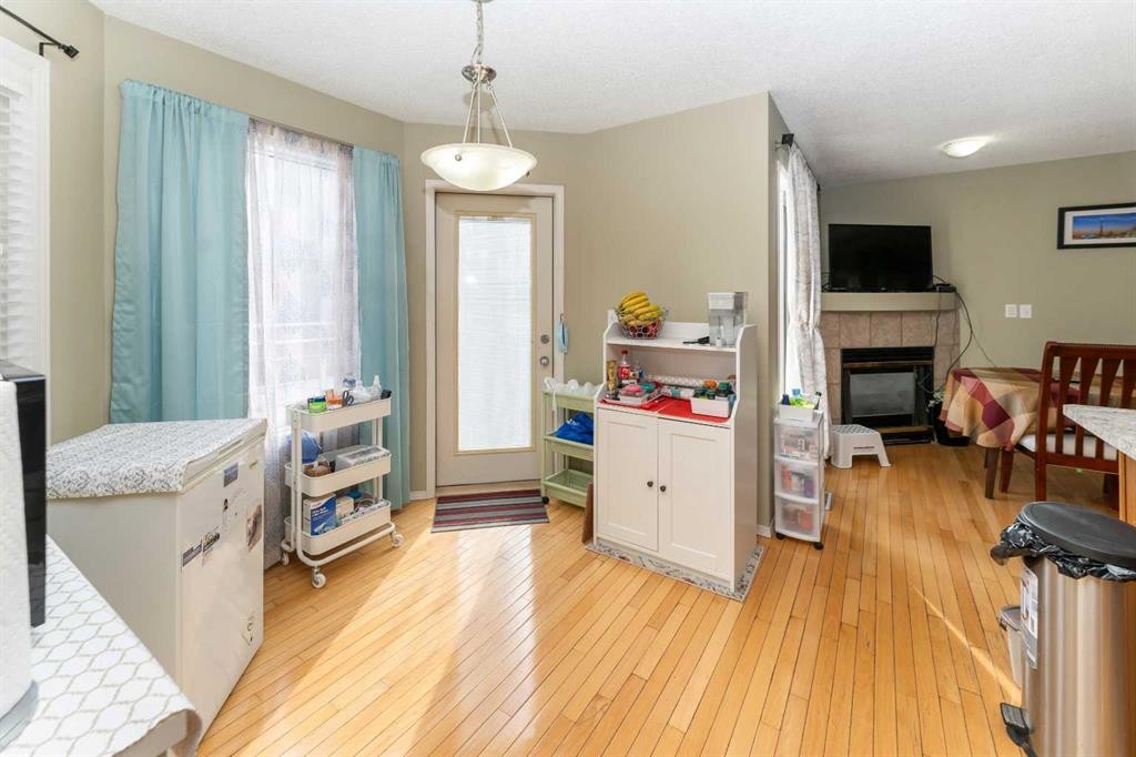 63 Hawkmount Green Nw, Calgary, AB - Indoor With Fireplace