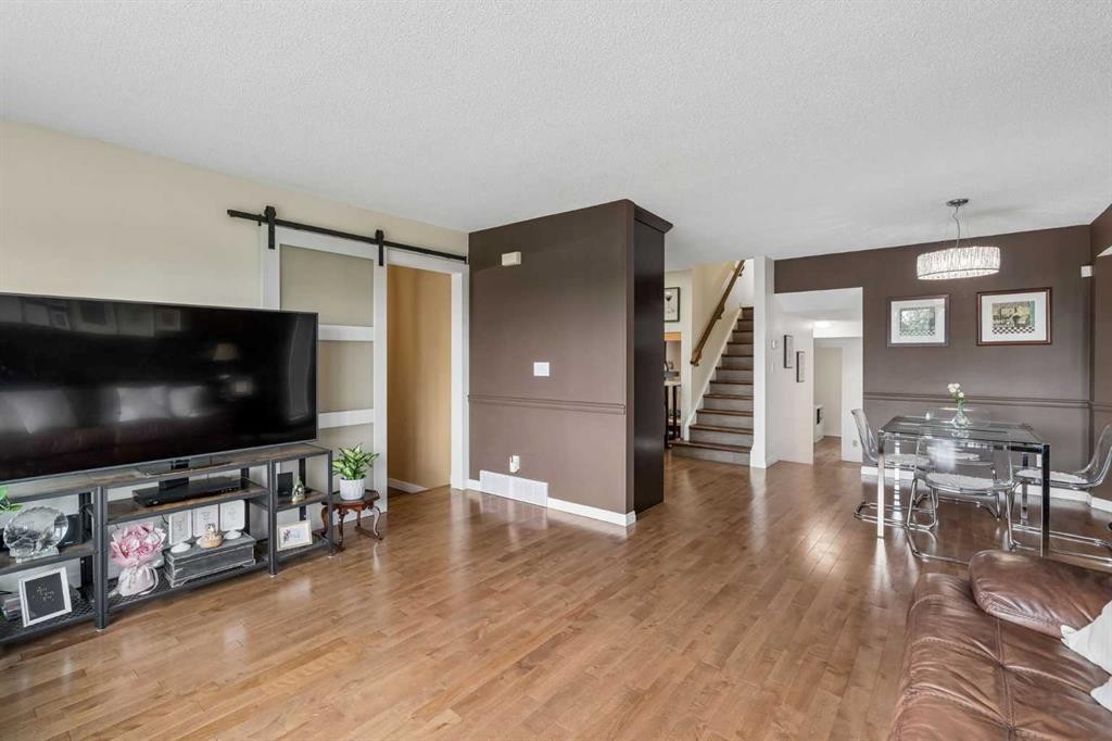 744 Riverbend Drive Se, Calgary, AB - Indoor Photo Showing Living Room