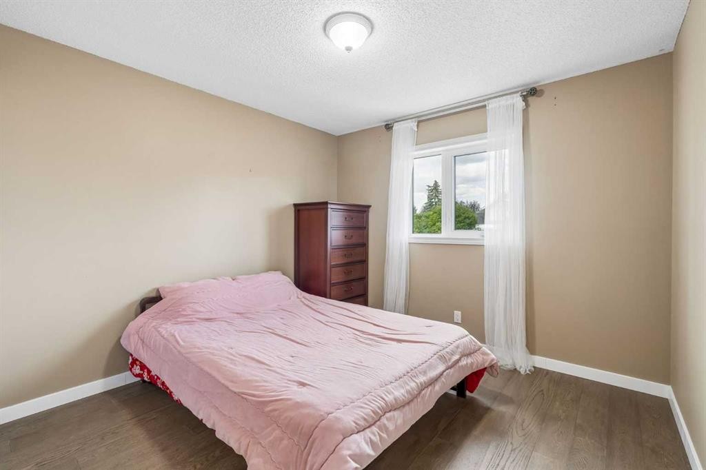 744 Riverbend Drive Se, Calgary, AB - Indoor Photo Showing Bedroom