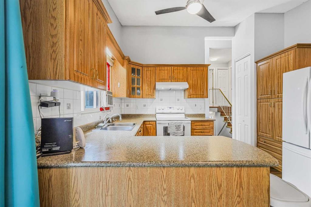 5112 Maryvale Drive Ne, Calgary, AB - Indoor Photo Showing Kitchen With Double Sink