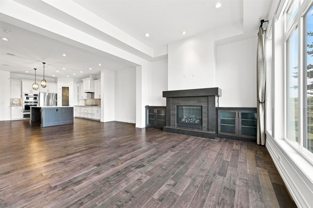 117 Spring Water Close, Heritage Pointe, AB - Indoor Photo Showing Living Room With Fireplace