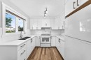 77 Martinbrook Road Ne, Calgary, AB  - Indoor Photo Showing Kitchen With Double Sink 