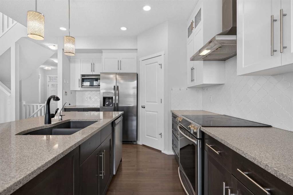 80 Nolancrest Green Nw, Calgary, AB - Indoor Photo Showing Kitchen With Stainless Steel Kitchen With Double Sink With Upgraded Kitchen