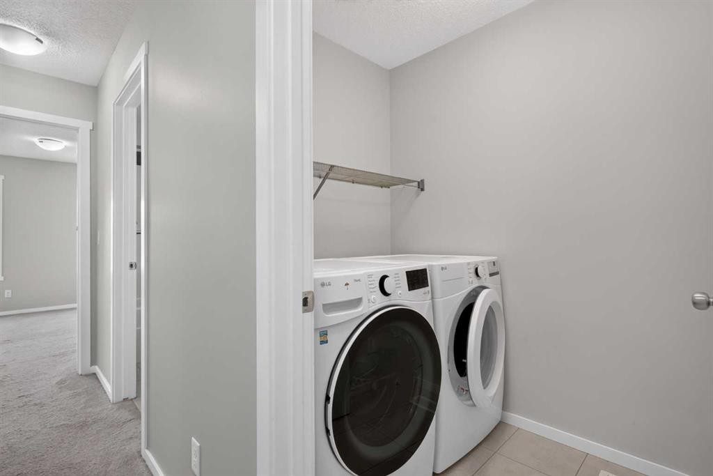 80 Nolancrest Green Nw, Calgary, AB - Indoor Photo Showing Laundry Room