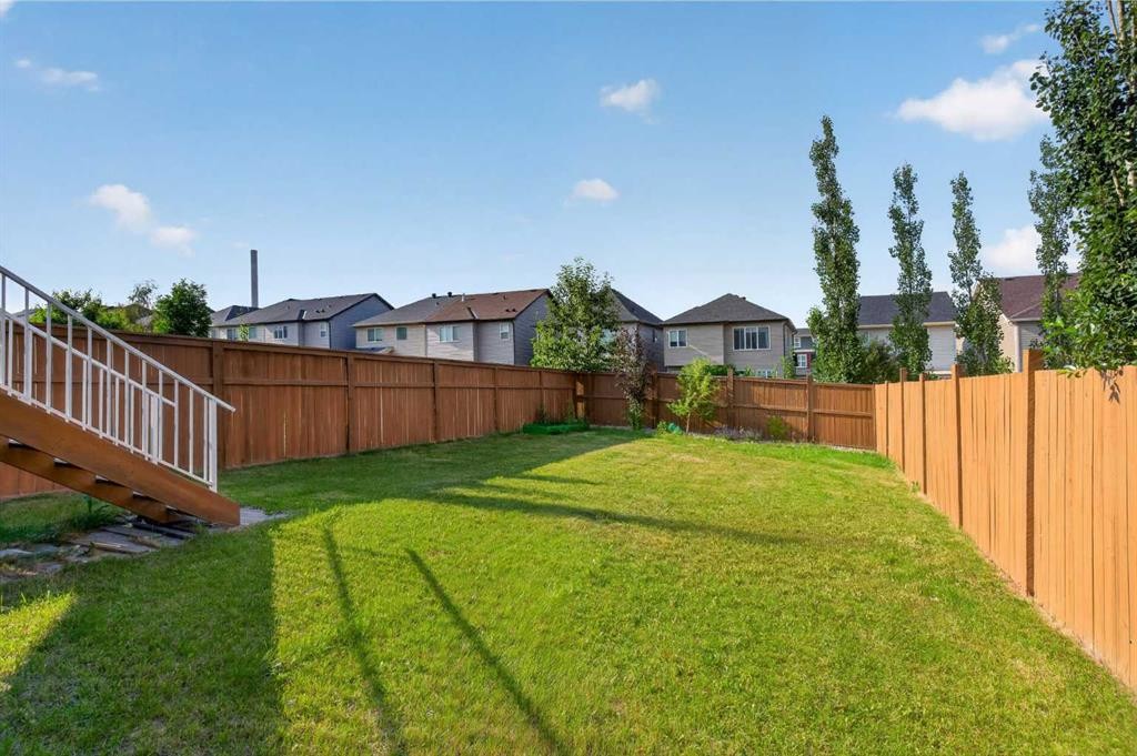 80 Nolancrest Green Nw, Calgary, AB - Outdoor With Backyard