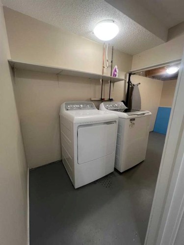116 Mckerrell Close Se, Calgary, AB - Indoor Photo Showing Laundry Room