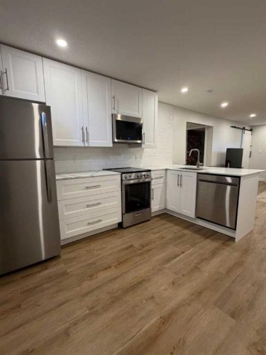 116 Mckerrell Close Se, Calgary, AB - Indoor Photo Showing Kitchen With Stainless Steel Kitchen