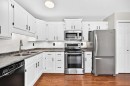 116 Mckerrell Close Se, Calgary, AB  - Indoor Photo Showing Kitchen With Stainless Steel Kitchen With Double Sink 