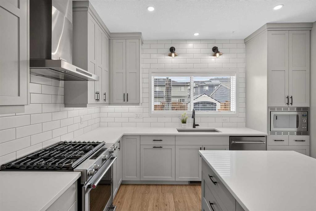 374 Wolf Creek Manor Se, Calgary, AB - Indoor Photo Showing Kitchen With Upgraded Kitchen